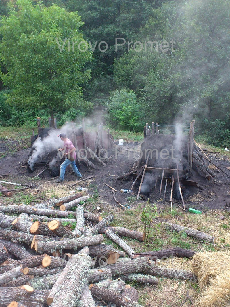 Charcoal being carbonized and cooled